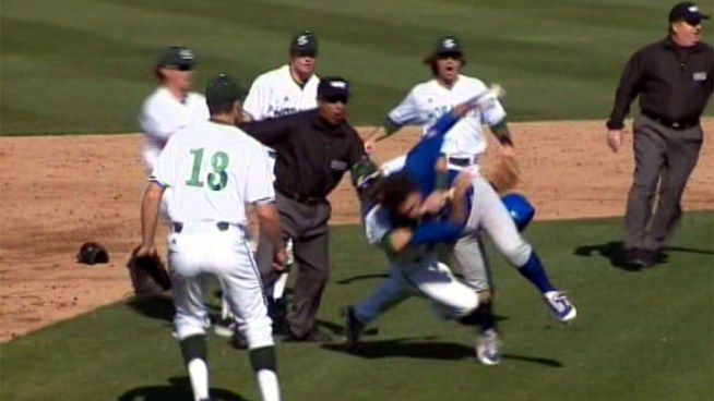 A fight erupts between two college baseball teams, and the entire skirmish is caught on video. This clip was recorded by NBC affiliate KCRA in Sacramento on Friday, Feb. 22, 2013.