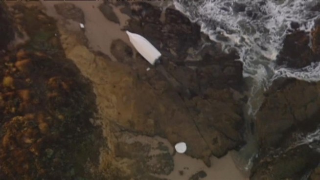 The families of Carl Deng of Ping Yau Tsang find their jackets on the San Mateo County shore. The fishermen have been missing since Sunday. Bob Redell reports.