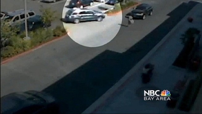 Police release new surveillance video of  a violent carjacking