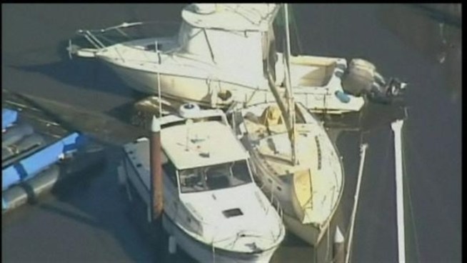 Dozens of boats were damaged Friday as the tsunami struck <a title=