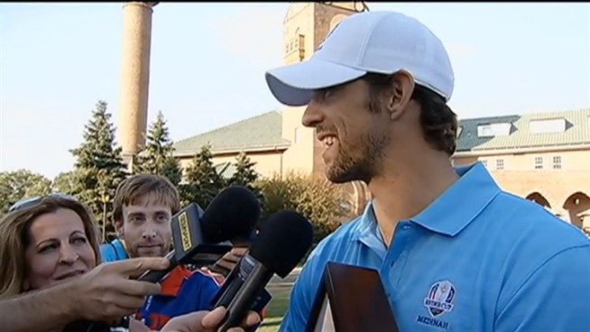 Olympian Michael Phelps and actor-comedian George Lopez won the first-ever 2012 Ryder Cup Captains and Celebrity Scramble Tuesday along with captains Hal Sutton and Lanny Wadkins.