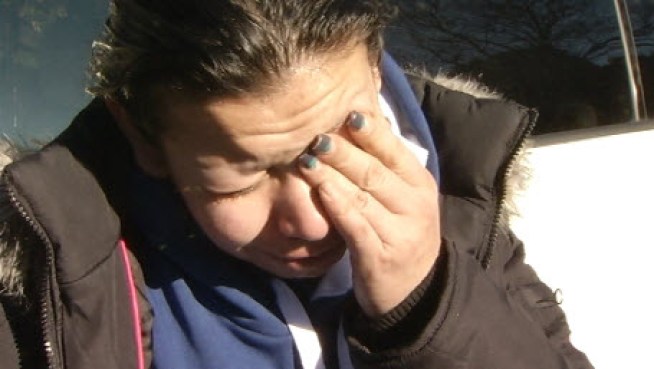 Cecilia Maldonado cries over the death of her 4-year-old Kyla, and her parents, all of whom died in a San Jose apartment fire on Saturday night.