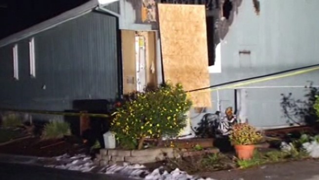 Christie Smith talks to neighbors who tried to save a couple trapped in their home overnight after fire breaks out.