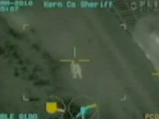 A deputy in Bakersfield pulls a man away from railroad tracks just in time.
