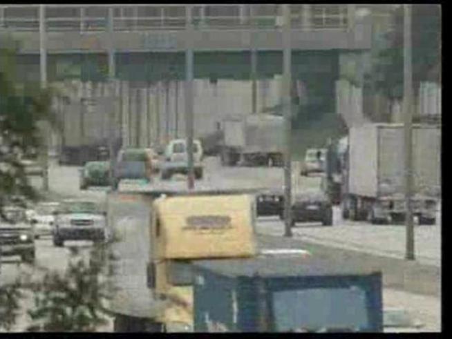 An obscure state law allows some public employees and their families to ignore citations for red-light camera and toll violations with impunity.