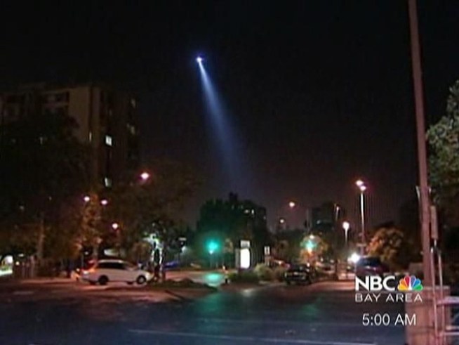 The suspect got away after shooting at cops from a building in <a title=