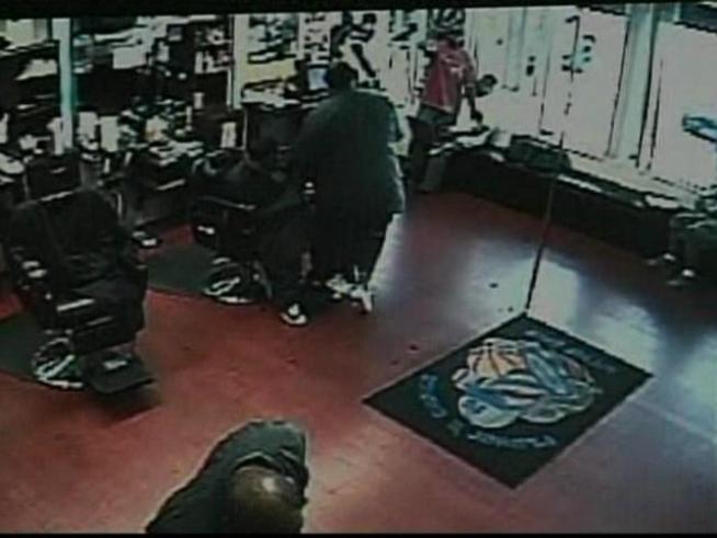 Armed gunmen storm a Miami barber shop and rapper Brisco appears to be the intended target.
