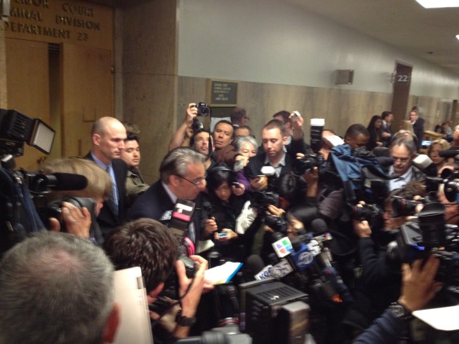 The sheriff wiped away tears as he faced reporters after being sentenced in a domestic violence case.