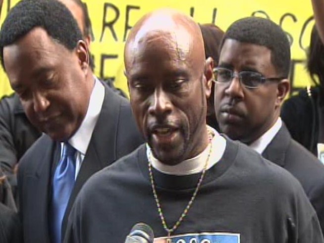 The uncle of Oscar Grant, Cephus Johnson, answers questions outside the trial of Johannes Mehserle.