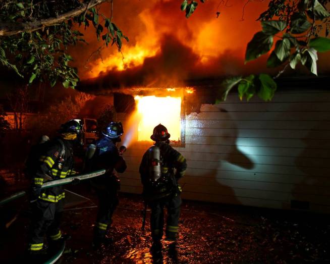 San Jose firefighters fought a 2-alarm fire Friday morning where a couple inside the home, which was storing ammunition, was injured, according to the homeowner's brother-in-law. Bob Redell reports.