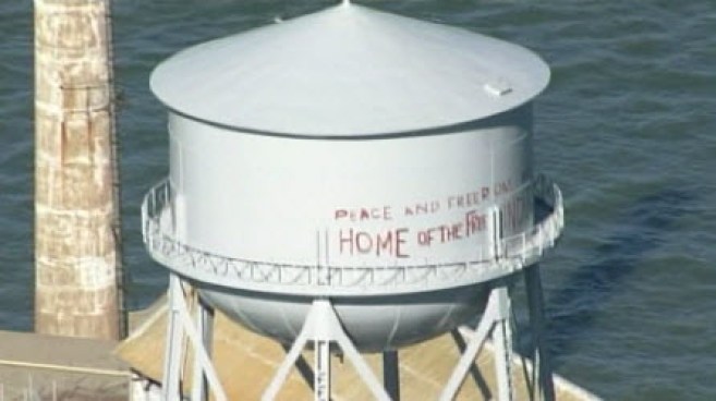 The National Park Service has restored graffiti on Alcatraz that was painted during the island's occupation by Native Americans in the late 1960s and early 1970s.  The graffiti on a water tower reads ``Peace and Freedom Welcome Home of the Free Indian Land.'' The graffiti on a water tower reads ``Peace and Freedom Welcome Home of the Free Indian Land.''