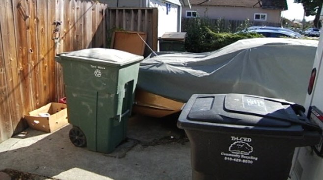 A Union City resident was taking out the trash early Sunday morning when she discovered a body in her trash can.