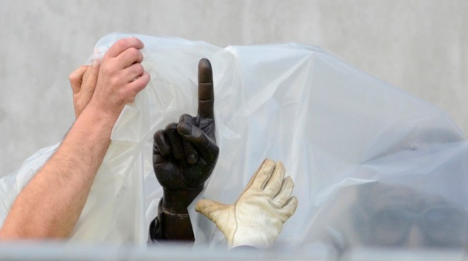 The famed statue of Joe Paterno was taken down from outside the Penn State football stadium Saturday.