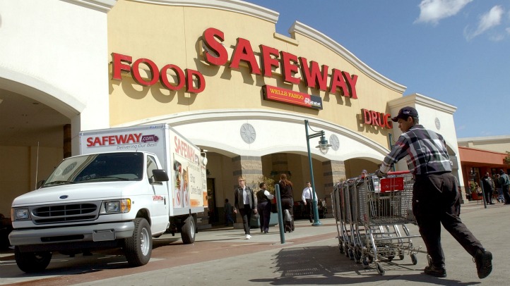 A new Safeway.com delivery van is parked in front of a Safeway store March 13, 2002 in San Francisco, CA. Safeway Inc. formally launched the Safeway.com grocery home delivery service to consumers living in the greater San Francisco Bay Area. Safeway will 