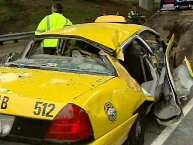 Two men were nearly flattened Friday when a giant pipe fell 75-100 feet and crushed their taxi.