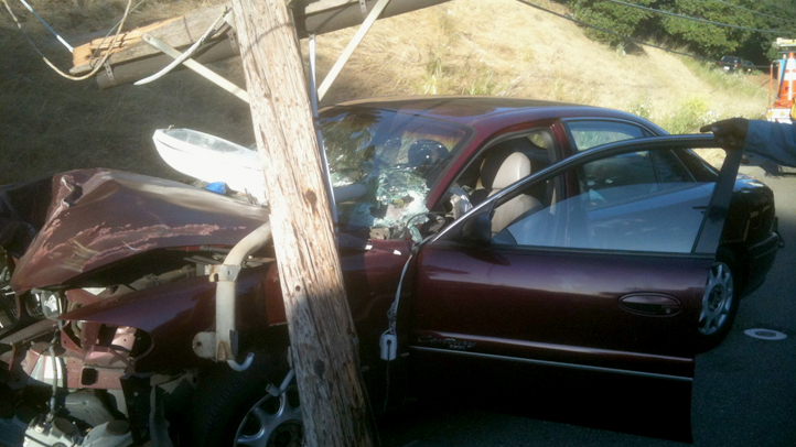 The driver of this car crashed into a power pole on Mountain Boulevard in Oakland, Calif., on June 8, 2012. The crash started a 3-alarm fire near I-580 and left about 6,800 people without power.