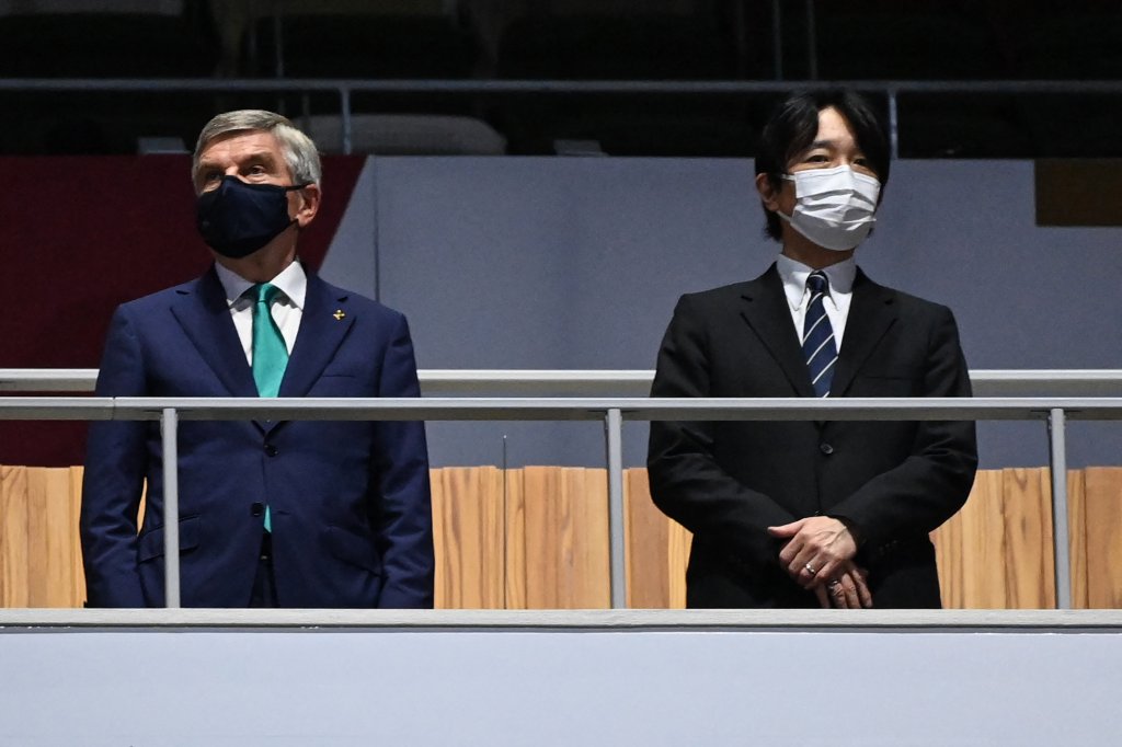President of the International Olympic Committee (IOC) Thomas Bach, left, and Japan's Emperor Naruhito attend the closing ceremony of the Tokyo 2020 Olympic Games, at the Olympic Stadium, in Tokyo, on Aug. 8, 2021.