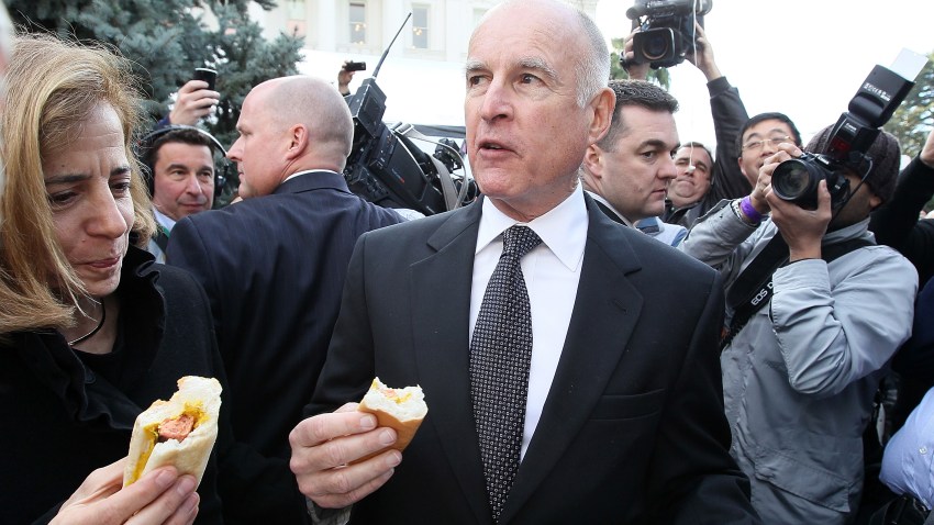 Gov. Jerry Brown eating hot dog