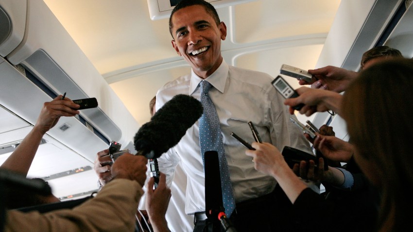 030309 obama media p1