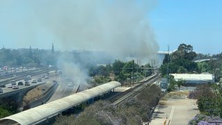 Fires burn near Highway 87 in San Jose.