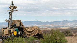 In this April 4, 2019 photo, provided by the U.S. Army, a mobile surveillance camera system manned by soldiers monitors a sector near the Presidio Border Patrol Station at Presidio, Texas.