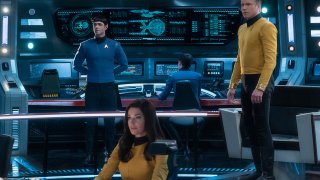 This image released by CBS All Access shows, from left, Ethan Peck as Spock, Rebecca Romijn as Number One, and Anson Mount as Captain Pike of the the CBS All Access series "Star Trek: Strange New Worlds."