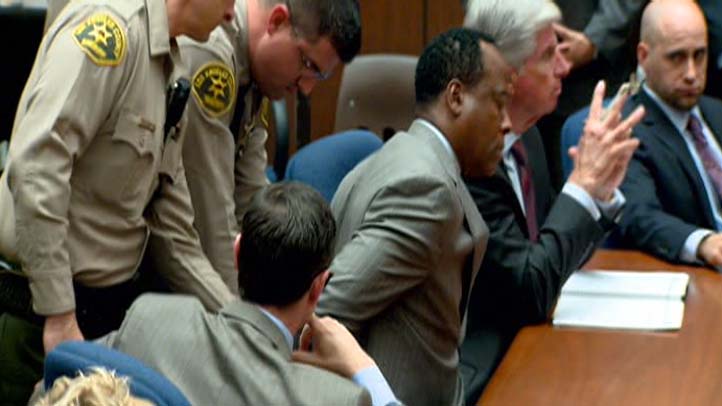 Conrad Murray handcuffs