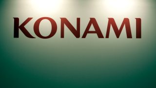 A Konami Corp. logo is seen at the Gamescom trade fair in Cologne, Germany, on Thursday, Aug. 19, 2010. Sony Corp. and Microsoft Corp. are introducting motion-activated products this year for their respective PlayStation 3 and Xbox 360 video game consoles to compete with Nintendo Co.'s industry-leading Wii gaming console. Photographer: Ralph Orlowski/Bloomberg via Getty Images