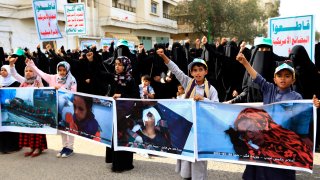 Yemeni chidren and women protests airstrikes that have killed civilians