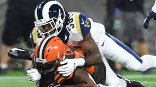 CLEVELAND, OH – SEPTEMBER 22, 2019: Running back Nick Chubb #24 of the Cleveland Browns is tackled by inside linebacker Cory Littleton #58 of the Los Angeles Rams in the second quarter of a game on September 22, 2019 at FirstEnergy Stadium in Cleveland, Ohio. Los Angeles won 20-13. (Photo by: 2019 Nick Cammett/Diamond Images via Getty Images)