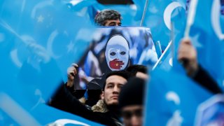 Demonstrators take part in a demonstration in support of Uyghur Turks against human rights violations of China, in Berlin, Germany on December 27, 2019.