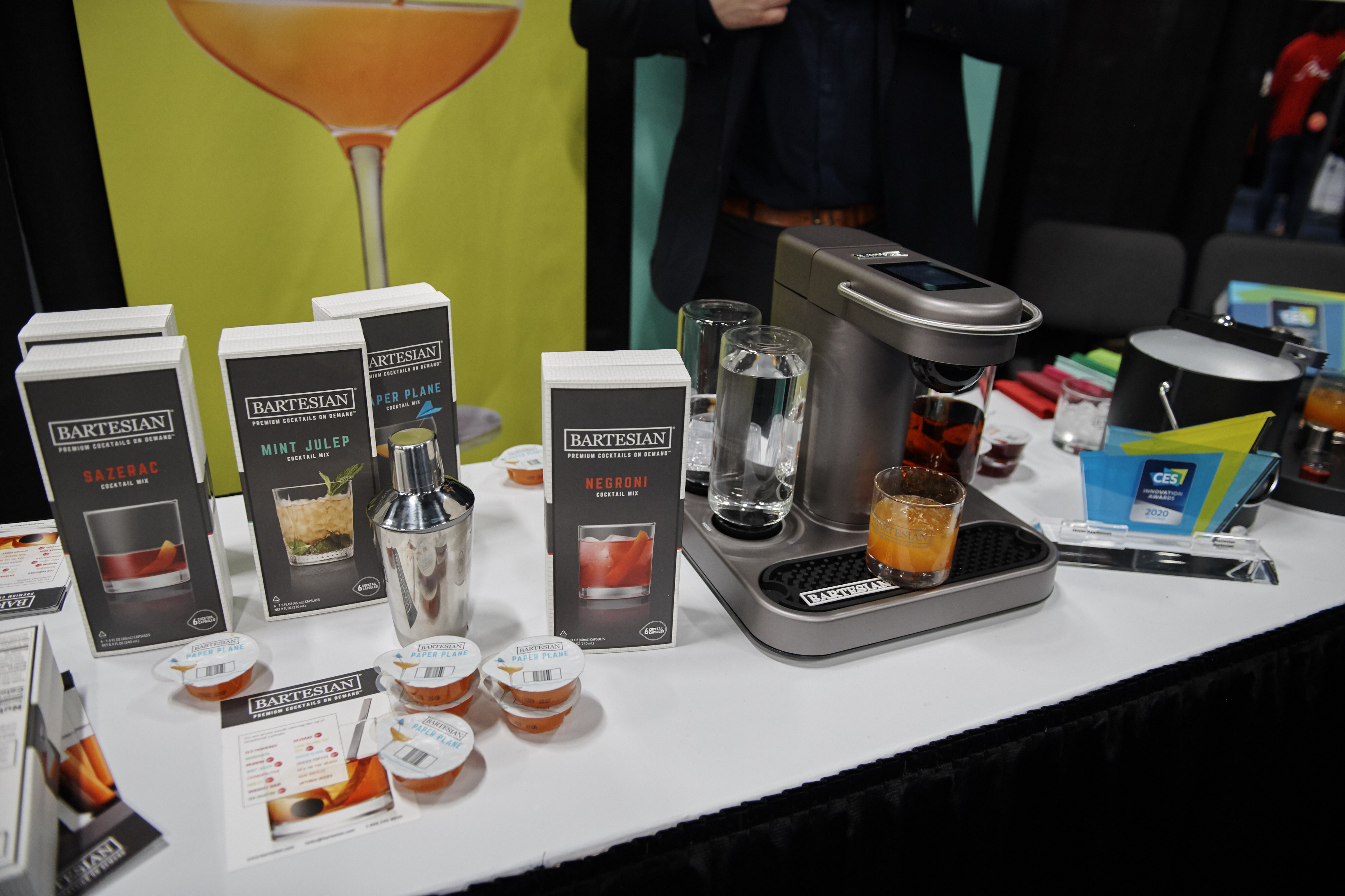 A Bartesian Inc. capsule cocktail machine pours out a cocktail during a press event for CES 2020 at the Mandalay Bay Convention Center, Jan. 5, 2020, in Las Vegas, Nevada. The Bartesian does not come with the base spirits for a cocktail, but does pack everything else into capsules for your preferred mixed drink.