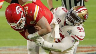 MIAMI, FLORIDA – FEBRUARY 02: Patrick Mahomes #15 of the Kansas City Chiefs is sacked by DeForest Buckner #99 of the San Francisco 49ers during the third quarter in Super Bowl LIV at Hard Rock Stadium on February 02, 2020 in Miami, Florida. (Photo by Sam Greenwood/Getty Images)