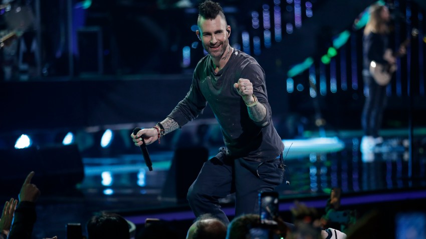 Adam Levine performs onstage