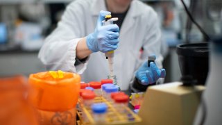 NUTLEY, NJ – FEBRUARY 28: A researcher works in a lab that is developing testing for the COVID-19 coronavirus at Hackensack Meridian Health Center for Discovery and Innovation on February 28, 2020 in Nutley, New Jersey. The facility develops novel therapies for some of the worlds most difficult diseases. At least 53 countries have reported cases of infection. (Photo by Kena Betancur/Getty Images)