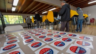 Voters cast their ballots at a voting center