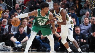 Marcus Smart of the Boston Celtics handles the ball against the Indiana Pacers on March 10, 2020, at Bankers Life Fieldhouse in Indianapolis.