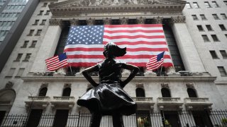 In this March 29, 2020, file photo, the New York Stock Exchange building is seen in the Financial District of New York City.