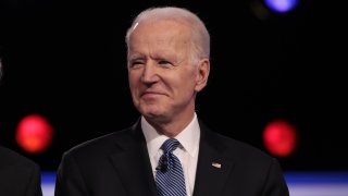 In this Feb. 25, 2020, file photo, Democratic presidential candidate former Vice President Joe Biden arrives on stage for the Democratic presidential primary debate at the Charleston Gaillard Center in Charleston, South Carolina.