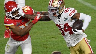 MIAMI, FLORIDA – FEBRUARY 02: Kendrick Bourne #84 of the San Francisco 49ers fights off the tackle of Charvarius Ward #35 of the Kansas City Chiefs in Super Bowl LIV at Hard Rock Stadium on February 02, 2020 in Miami, Florida. The Chiefs won the game 31-20. (Photo by Focus on Sport/Getty Images)