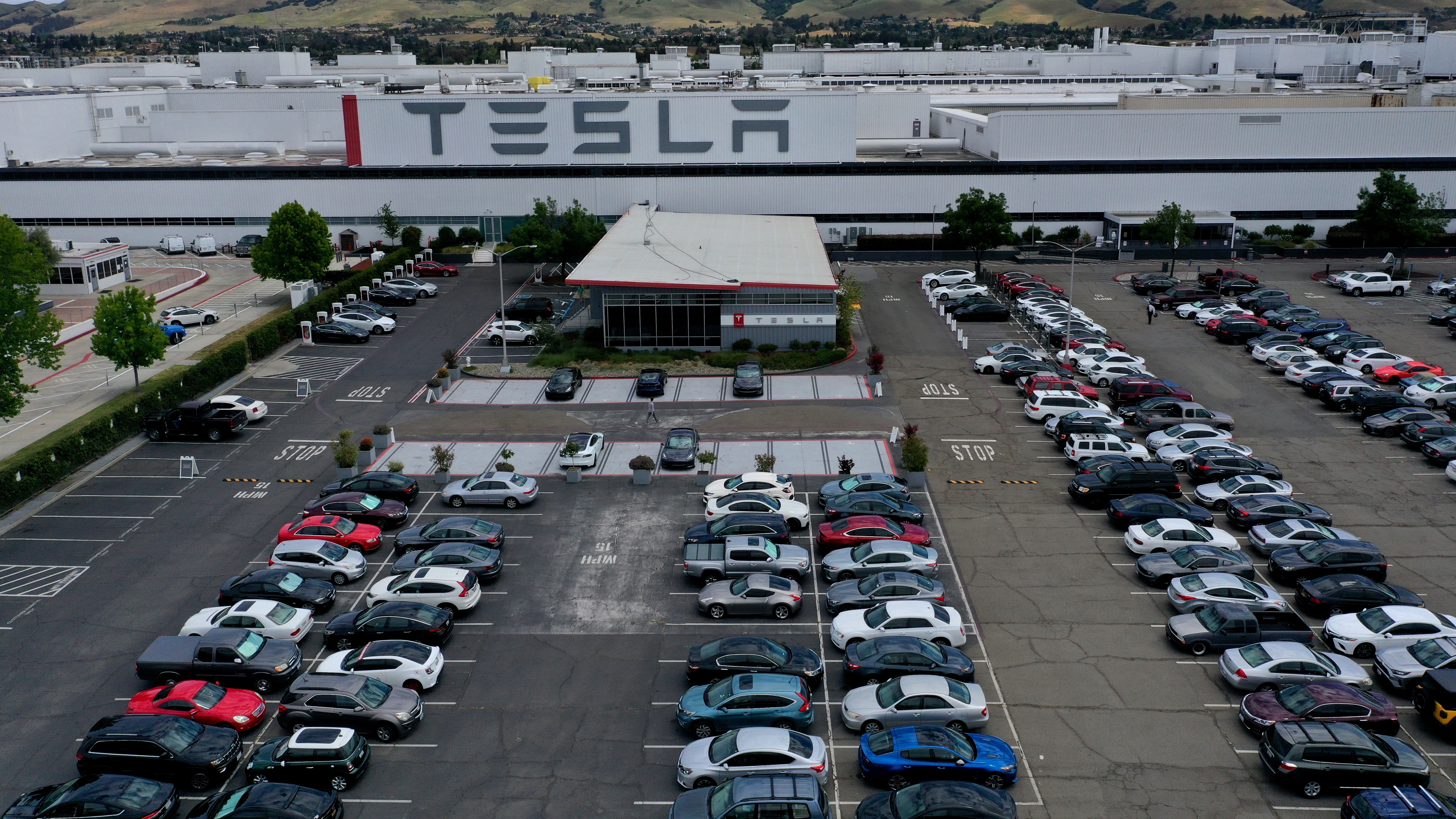 demand for investigation into working conditions at tesla facility in fremont