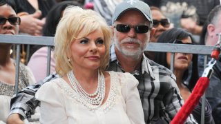 Jim Bakker is asking a judge to dismiss a state lawsuit accusing him of falsely claiming that a health supplement could cure the coronavirus. In this photo televangelist Jim Bakker and wife Lori Bakker attend the ceremony honoring BeBe Winans and CeCe Winans with a star on the Hollywood Walk of Fame on Oct. 20, 2011.