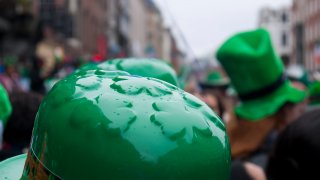 Revellers celebrating St. Patrick;s Day Parade, Dame Street, Dublin 2.