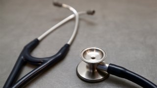 In this Dec. 4, 2014, file photo, a stethoscope is pictured in a General Practitioners surgery in London, England.