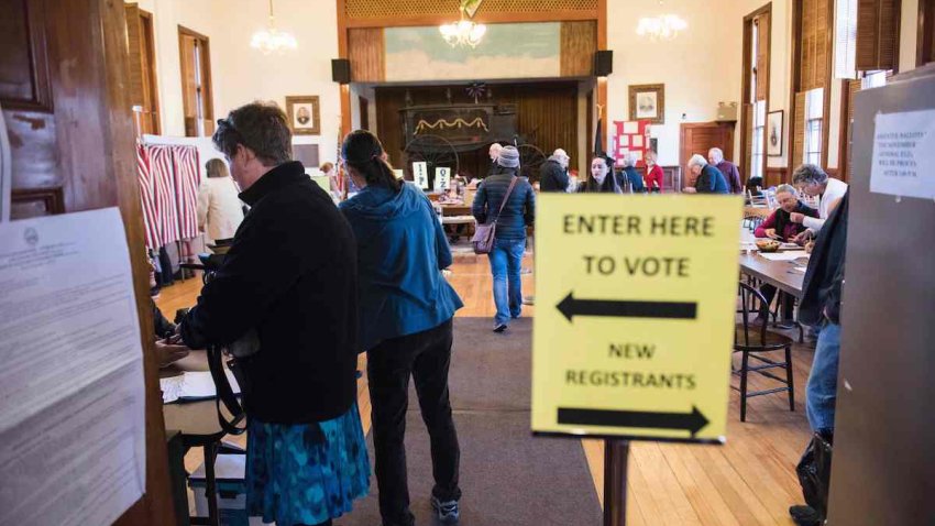 Voters cast their ballots in the presidential election at the Sutton town hall November 8, 2016 in Sutton, New Hampshire.
Eager voters crowded into polling stations to choose a new US president Tuesday after a wild and bitter contest between the billionaire populist Donald Trump and Hillary Clinton, the Democrat seeking to become the first woman to win the White House. / AFP / Ryan McBride        (Photo credit should read RYAN MCBRIDE/AFP via Getty Images)