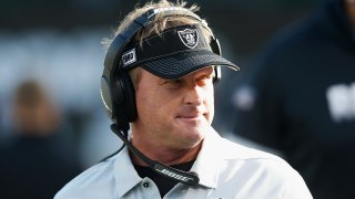 Jon Gruden looks on as the Oakland Raiders play the Tennessee Titans.