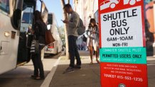 Shuttle bus sign boarding