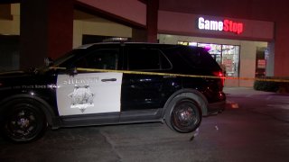Picture of Sheriff's car in front of GameStop