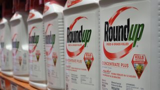 Bottles of Monsanto's Roundup are seen for sale, June 19, 2018, at a retail store in Glendale, Calif.