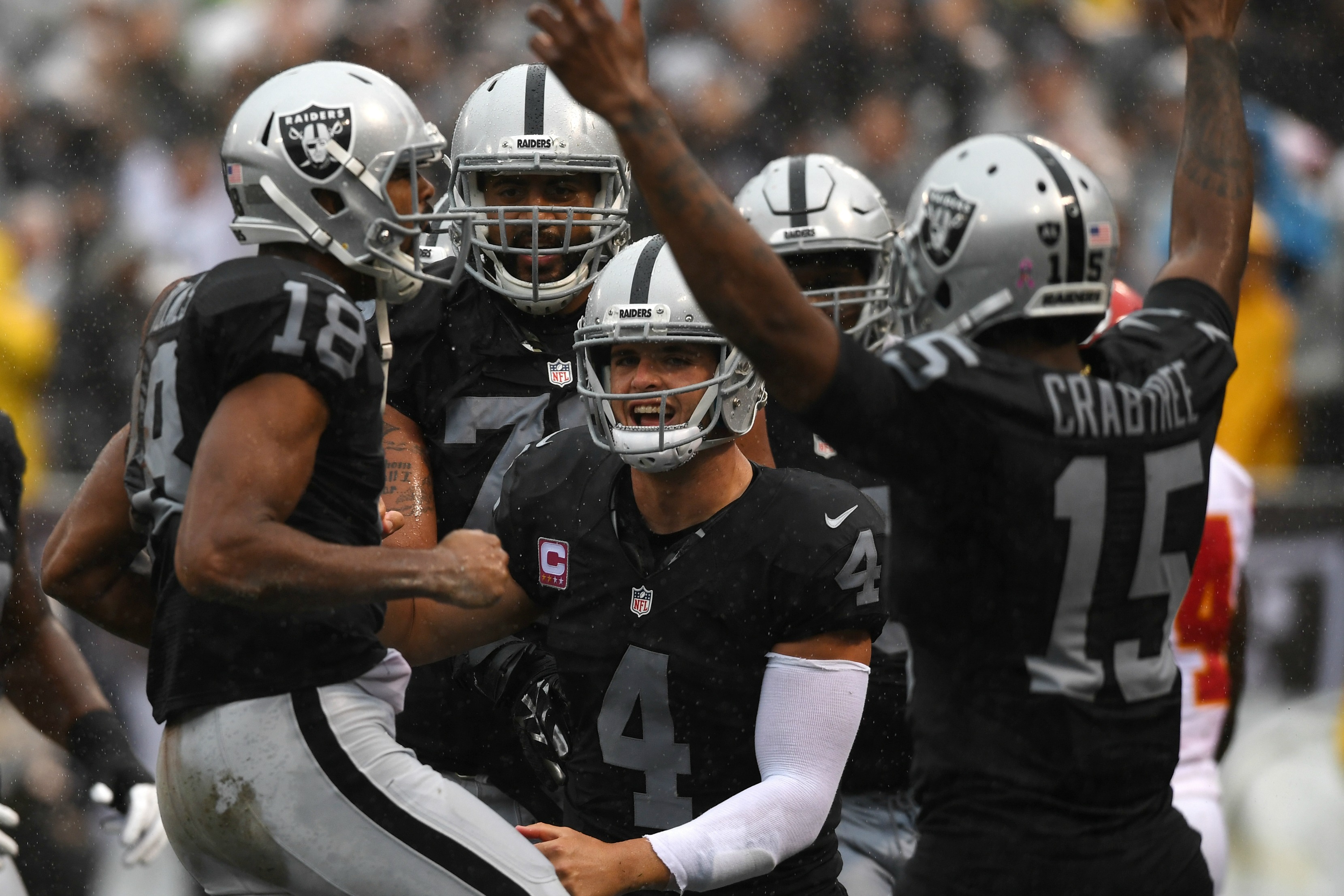 Raiders beat Chargers, head to playoffs for first time since 2002